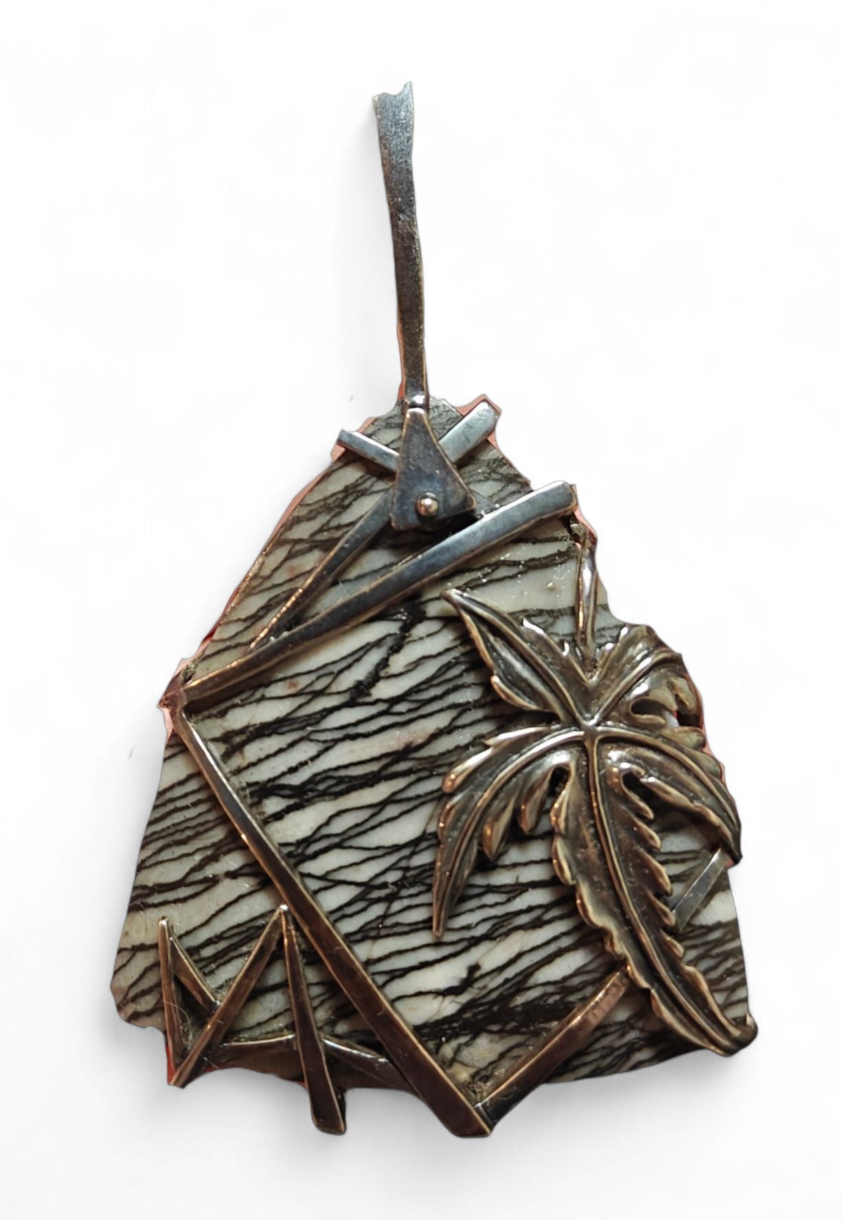 Front view of the Weaver of Dreams pendant from the Stone Garden Collection by Konforti Jewelry, handcrafted in 925 silver and centered with a 51.3 ct landscape jasper. The artistic silver tarnish enhances the natural stone patterns, creating a timeless and imaginative design.