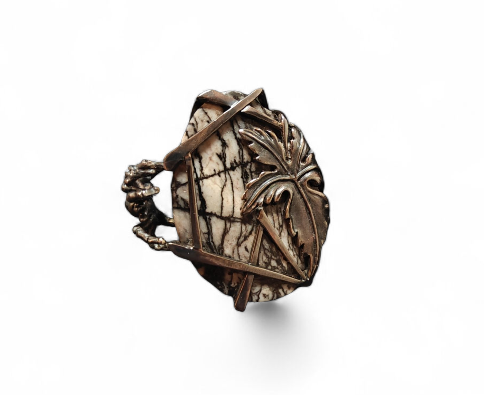 Front view of the Weaver of Dreams ring from the Stone Garden Collection by Konforti Jewelry, handcrafted in 925 silver and centered with a 51.3 ct hand-carved landscape jasper. The design reveals natural stone patterns enhanced with artistic silver tarnishing that evoke timeless imagination and artistry.