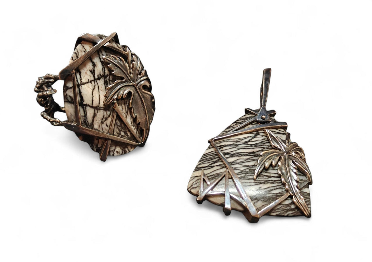 The Weaver of Dreams set from the Stone Garden Collection by Konforti Jewelry, featuring a handcrafted 925 silver pendant and matching ring. Each piece is centered with a 51.3 ct landscape jasper and enhanced by artistic silver tarnishing that highlights the natural landscape patterns of the stone.