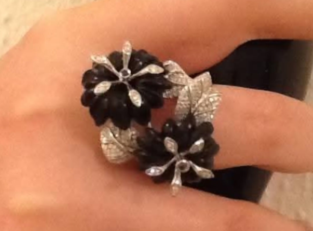 Close-up of hawk’s eye flowers set with diamonds on 18K white gold Black Petunia ring by Konforti Jewelry