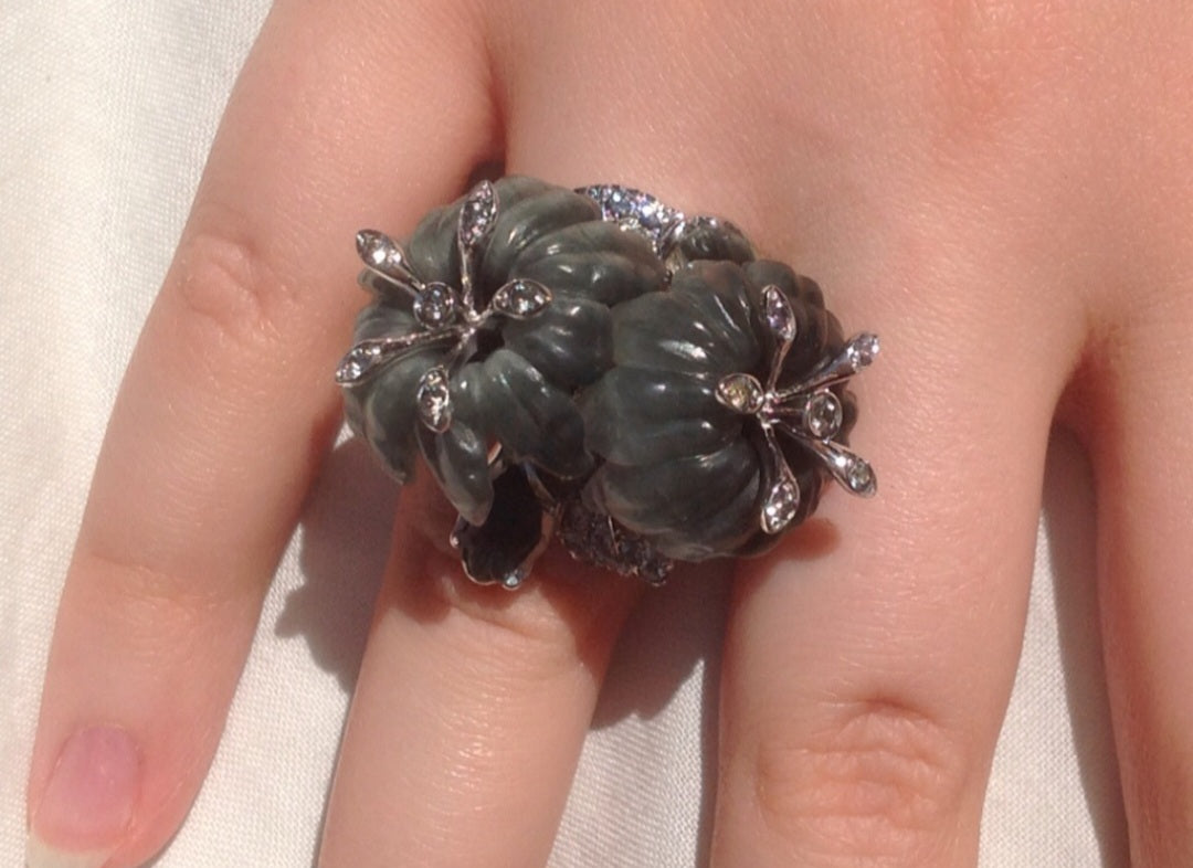 Close-up of cat’s eye gemstones and 3k grey sapphires set in 18K white gold, detailed craftsmanship by Konforti Jewelry