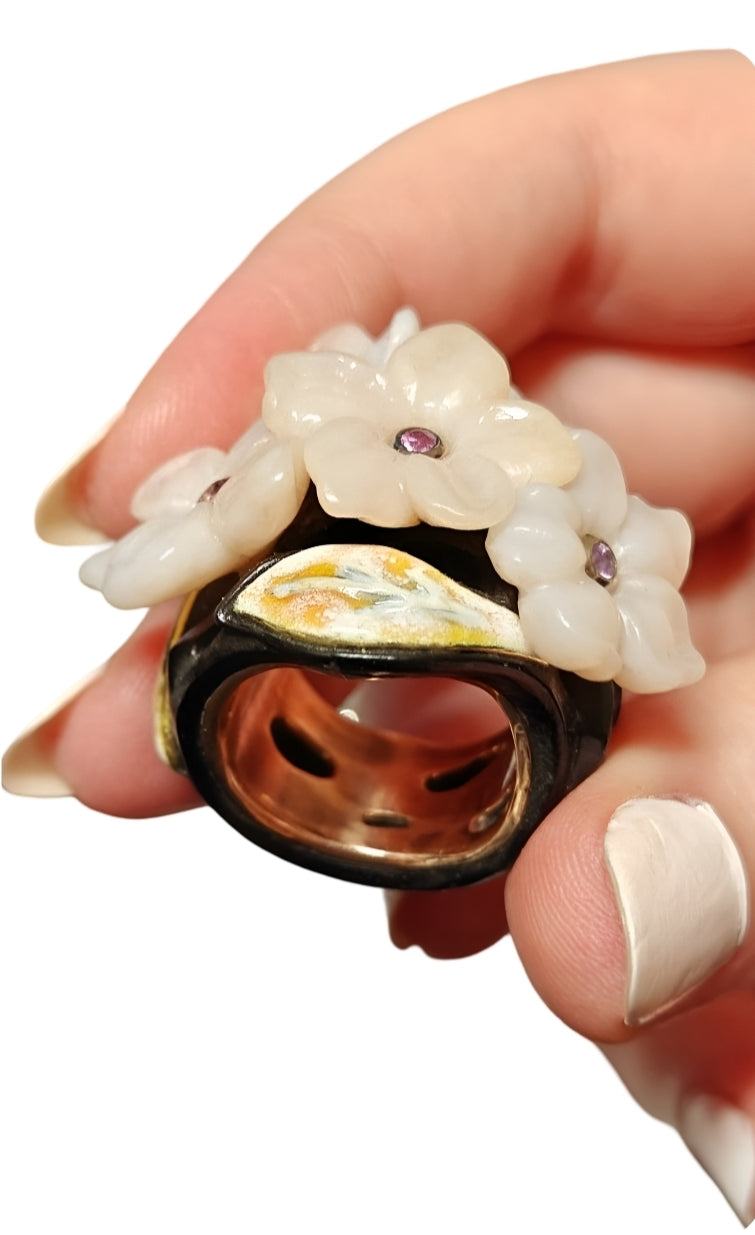 Luxury Pink Blossom ring showcasing layered gold, enamel paintings, ebony wood, and gemstone flowers, handcrafted by Konforti Jewelry