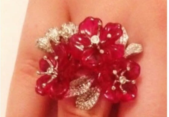 Close-up of Red Sakura Ring – Ruby Flowers and Pavé Diamonds in 18K White Gold