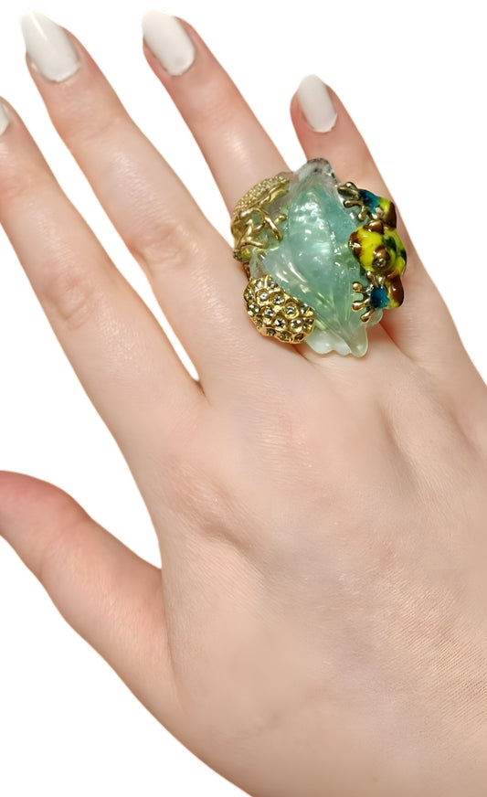 Summer Pond ring in 18K yellow gold featuring hand-carved 49K aquamarine gemstone, hot enamel paintings, and colorful sapphires by Konforti Jewelry