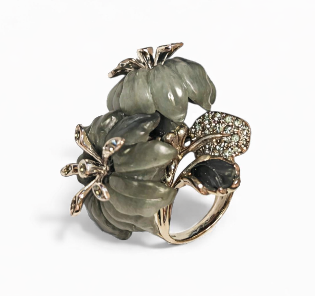 Asian Lilly ring handcrafted in 18K white gold with hand-carved cat’s eye stone flowers and grey sapphire accents from the Stone Garden Collection