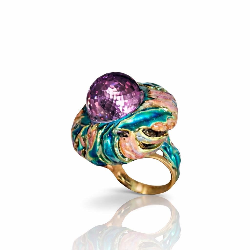 Purple Thistle ring by Konforti Jewelry featuring a large faceted purple amethyst briolette set in 18K yellow gold with hand painted multicolor enamel in turquoise, teal and soft pink tones from the Stone Garden Collection on white background.