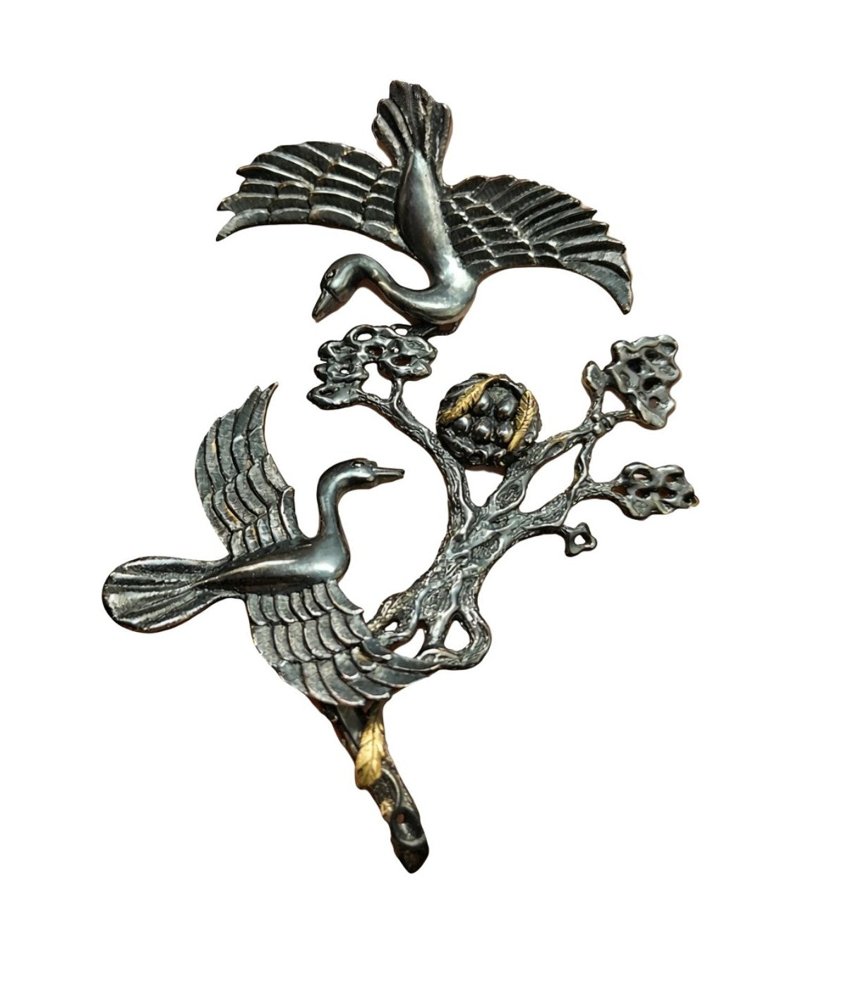 Front view of the Song of the Nest set from the Stone Garden Collection by Konforti Jewelry, featuring a handcrafted ring and bracelet in 960 silver with 24K gold-plated accents and artistic silver tarnishing that evoke the warmth and protection of a hidden nest.