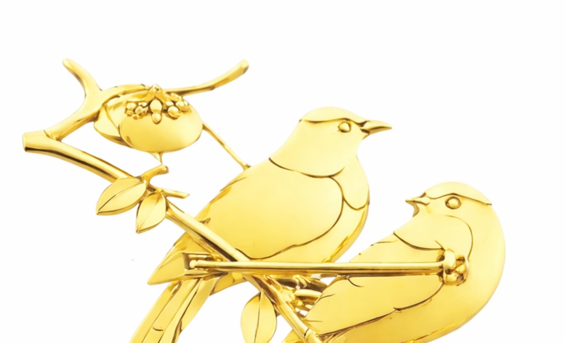 Detailed view of the handcrafted pin mechanism and polished 18K gold construction on the reverse of the Persimmon Garden bird brooch.