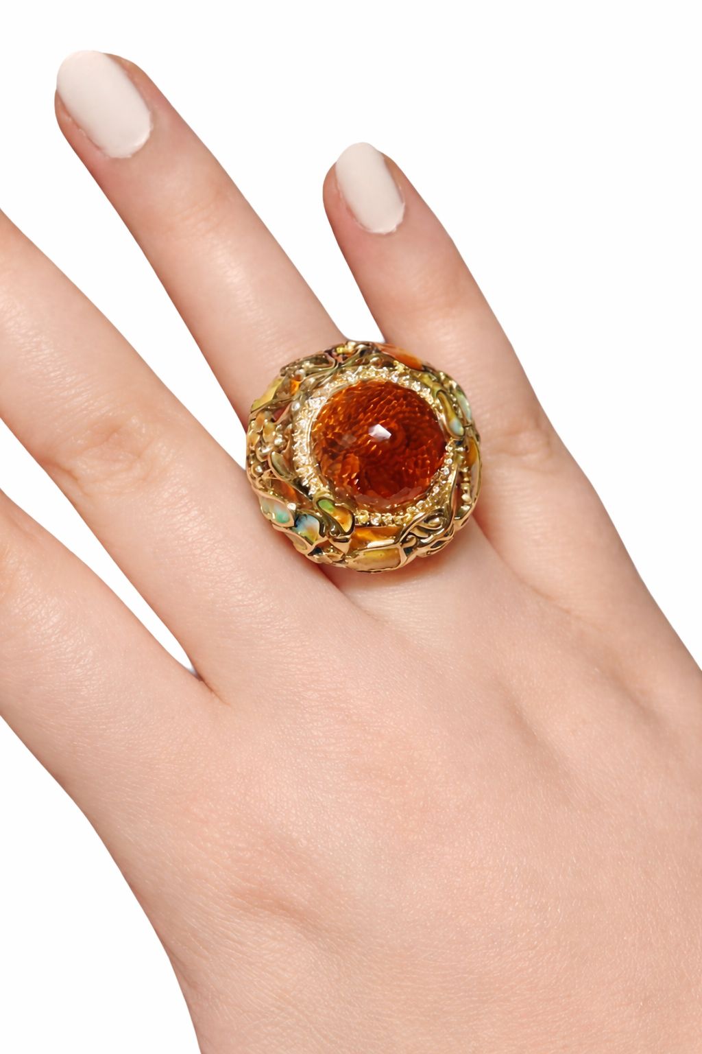 Autumn cocktail ring worn on hand, featuring a 33 carat pear-shaped Madeira citrine set in 18K yellow gold with hand-painted enamel