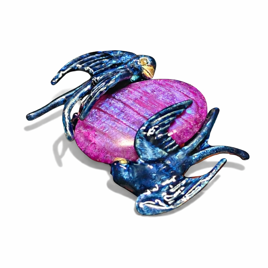 Front view of Celestial Flight art ring with hand carved purple moonstone center stone 960 silver setting and hand painted enamel swallows with gold accents