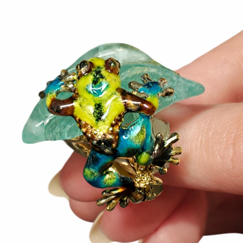18K gold frog ring featuring a hand-carved aquamarine centerpiece and enamel detailing
