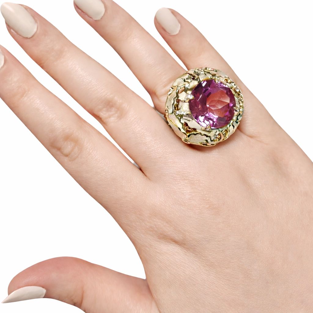 Statement Floral Fantasy ring worn on hand featuring large 32ct ametrine gemstone in 18K yellow gold with enamel lilies pink sapphires and diamonds from the Stone Garden Collection by Konforti Jewelry.