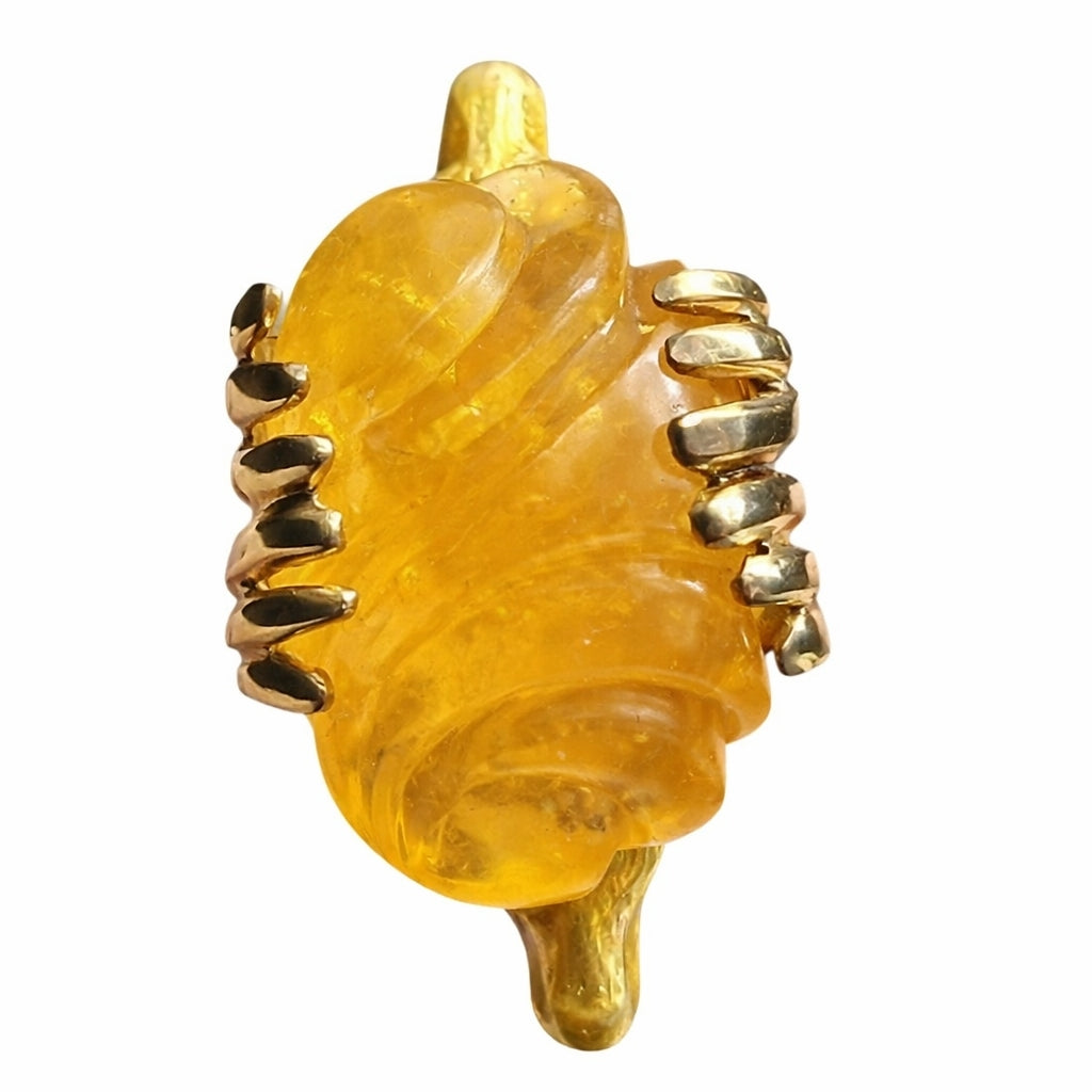 Top view of hand carved 90ct yellow lepidolite gemstone set in Guardians Of The Sun ring with sculptural stag heads and hot enamel by Konforti Jewelry