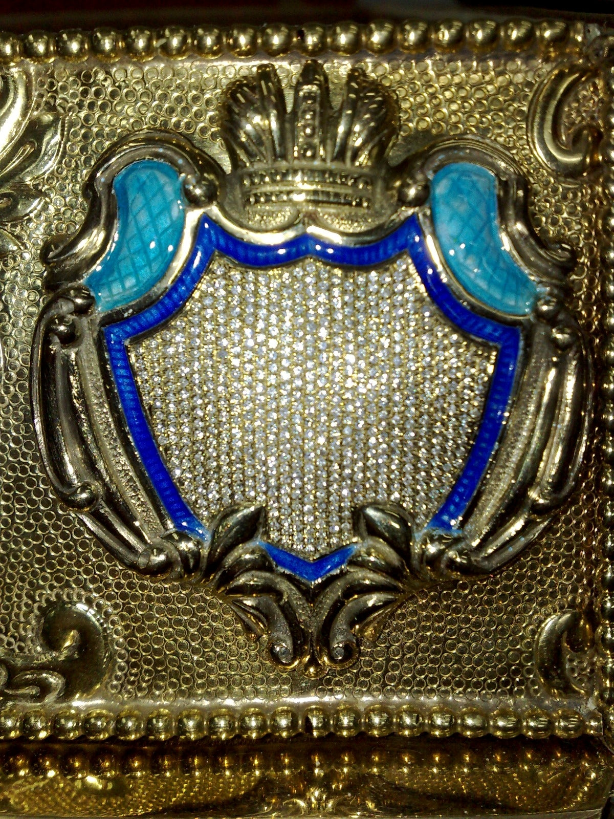 Close-up of diamond inlay on the silver chessboard, highlighting gemstone precision, Fabergé-style luxury craftsmanship, and sculptural metalwork.