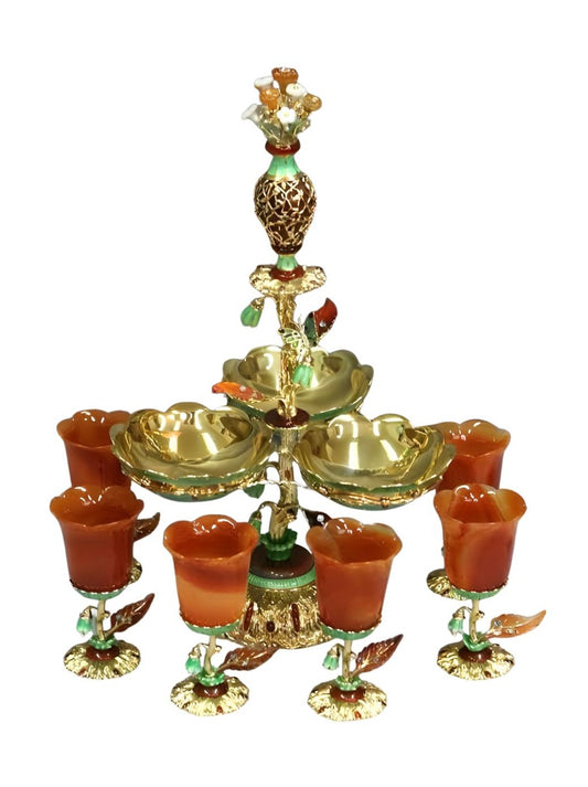 Royal Bouquet 18K gold centerpiece surrounded by six goblets, featuring carved red agate flowers, diamonds, sapphires, emeralds, and transparent hot enamel detailing.