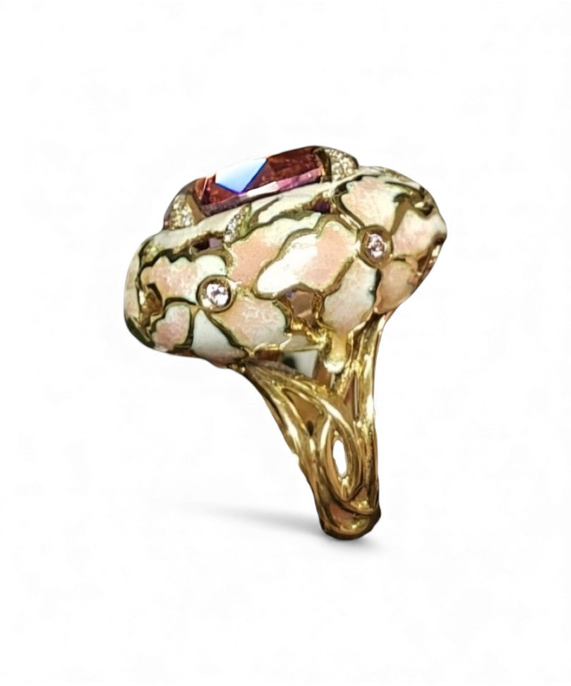 Angled image of the ametrine lily ring highlighting the dimensional hand-painted enamel lilies, pink sapphire settings, and the rich clarity of the 32ct ametrine gemstone.