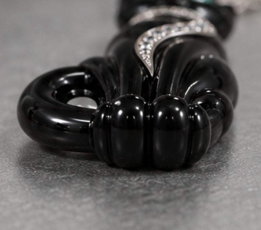 18K White Gold Black Onyx Cat Pendant with 0.80ct Diamonds and Emeralds