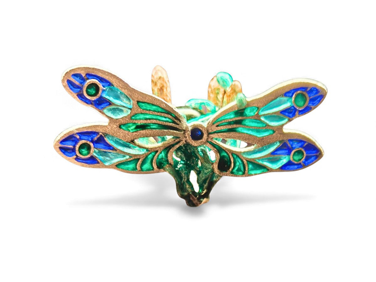 Front view of the Enchanted Dragonfly ring from the Stone Garden Collection, featuring a vivid 7.5ct green tourmaline set in 960 silver with hot enamel painting and delicate plique-à-jour dragonfly wings.
