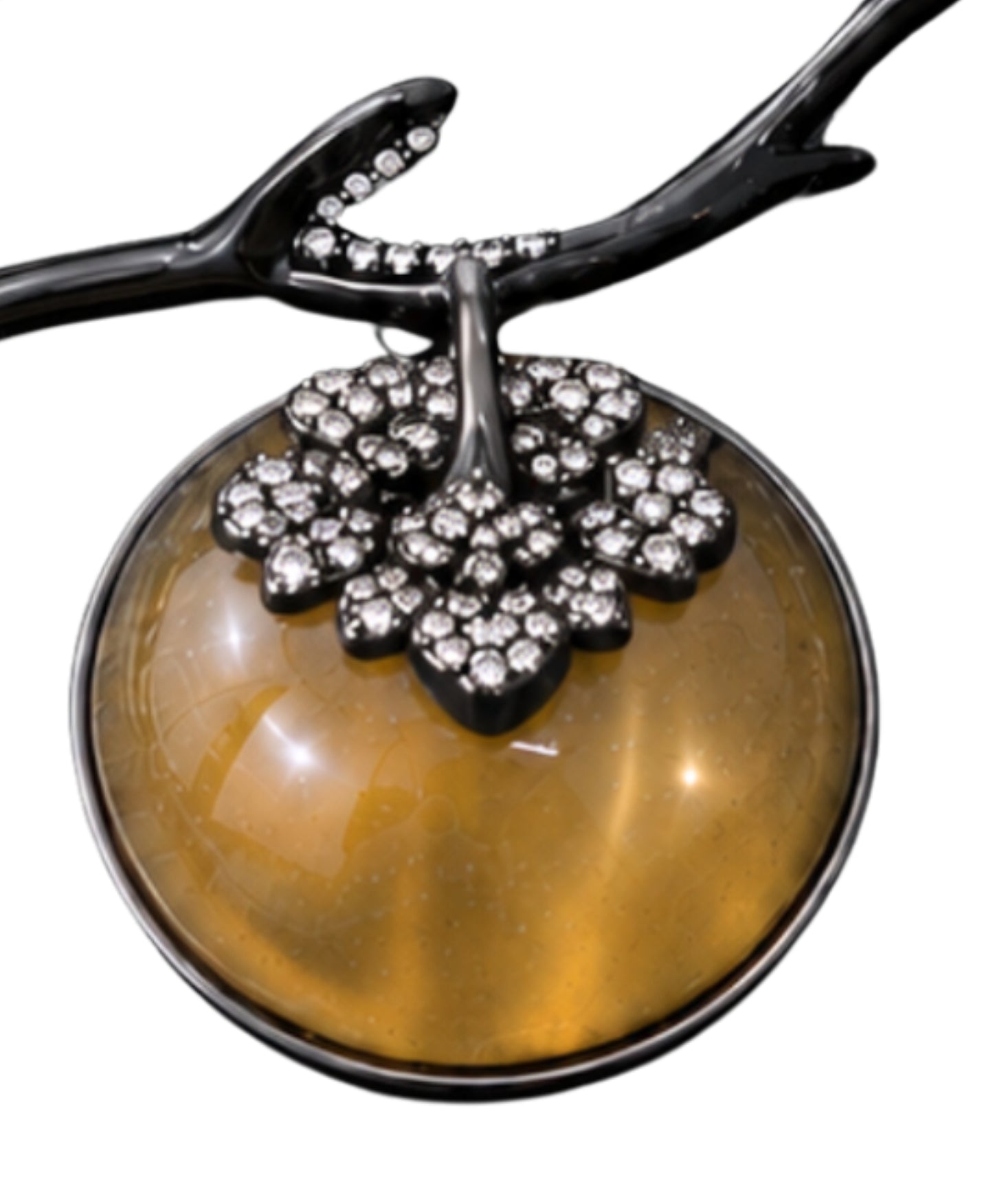 Close-up of the hand-carved gold lepidolite persimmon with pavé diamond-set calyx on the Golden Persimmon pendant.