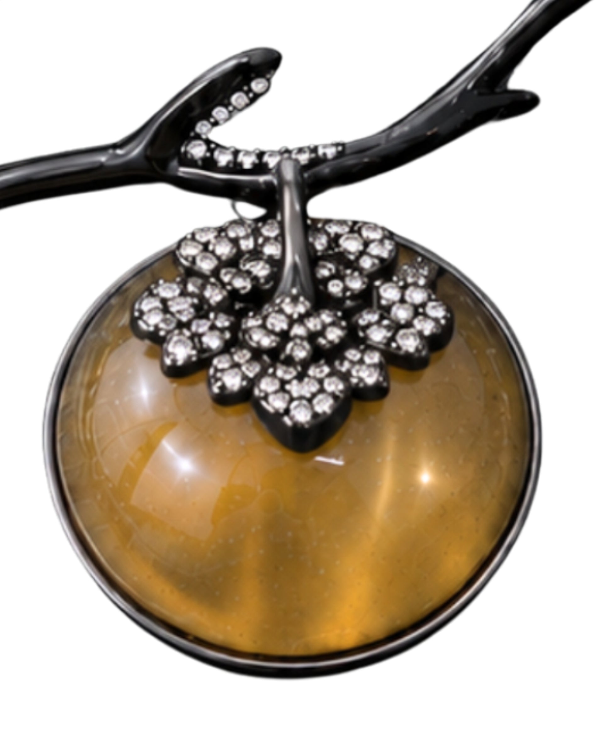 Close-up of the hand-carved gold lepidolite persimmon with pavé diamond-set calyx on the Golden Persimmon pendant.