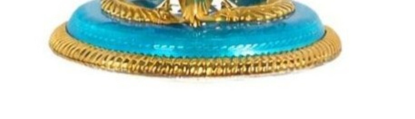 Guilloché enamel base in turquoise tones with gold detailing beneath silver and lapis lazuli centerpiece bowl