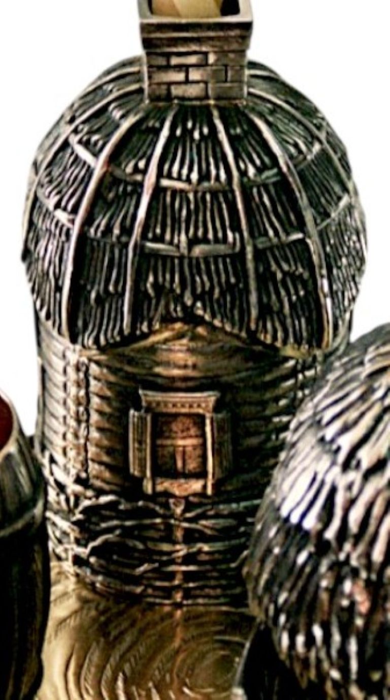 Close-up of the Havdalah candle holder shaped as a village house in sterling silver and 24K gold, inspired by traditional shtetl architecture