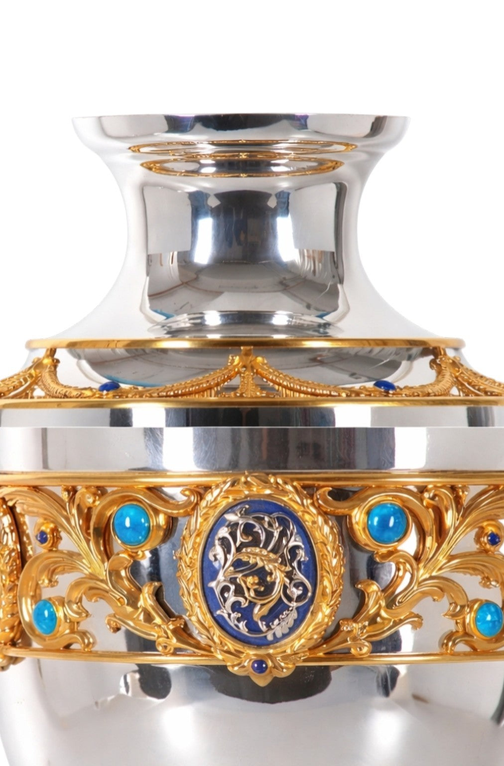 Detail of gilded heraldic medallion on handcrafted solid silver Imperial vase with lapis lazuli and enamel
