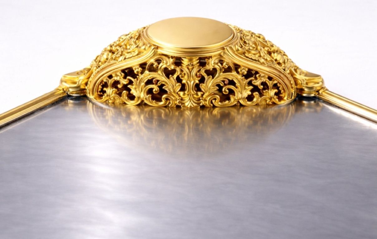 Handcrafted Imperial silver serving tray with ornate 24k gold gilded ornament and mirror polished surface