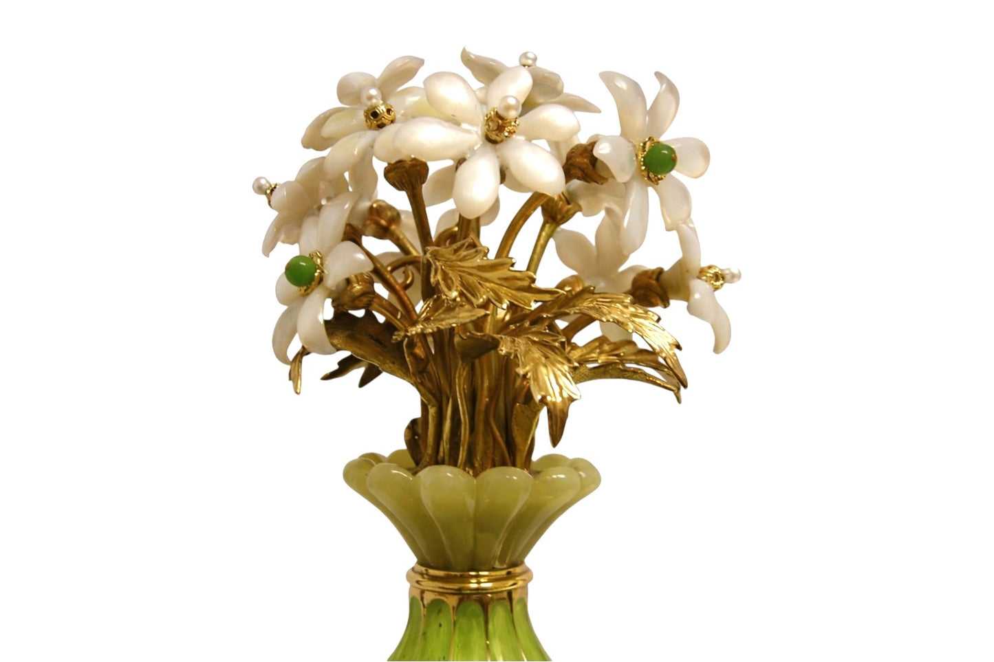 Close-up of mother-of-pearl floral bouquet with pearls and jade accents on gold-plated silver centerpiece