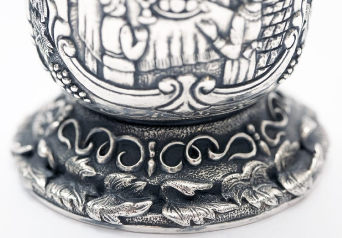 Kiddush cup base engraving wine grapes and ritual symbols sterling silver close up