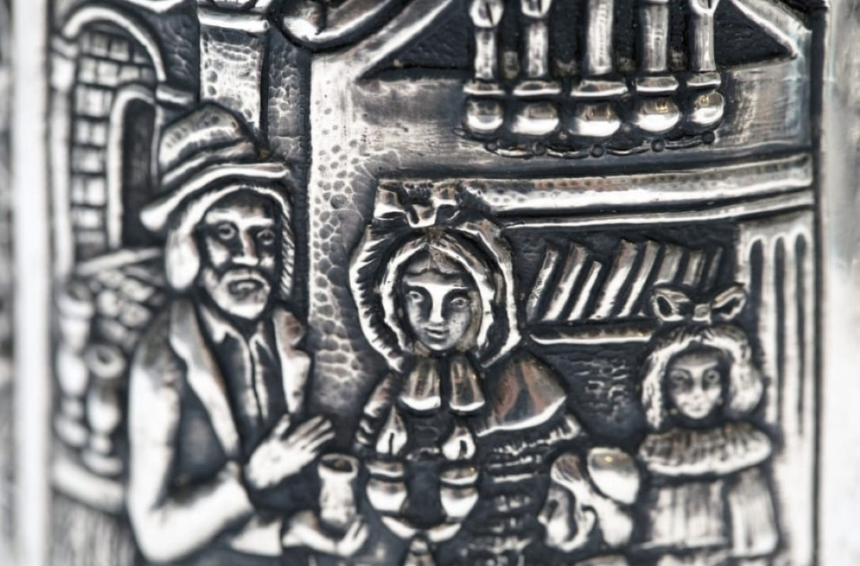 Kiddush cup family scene relief sterling silver showing Kiddush blessing over wine with children