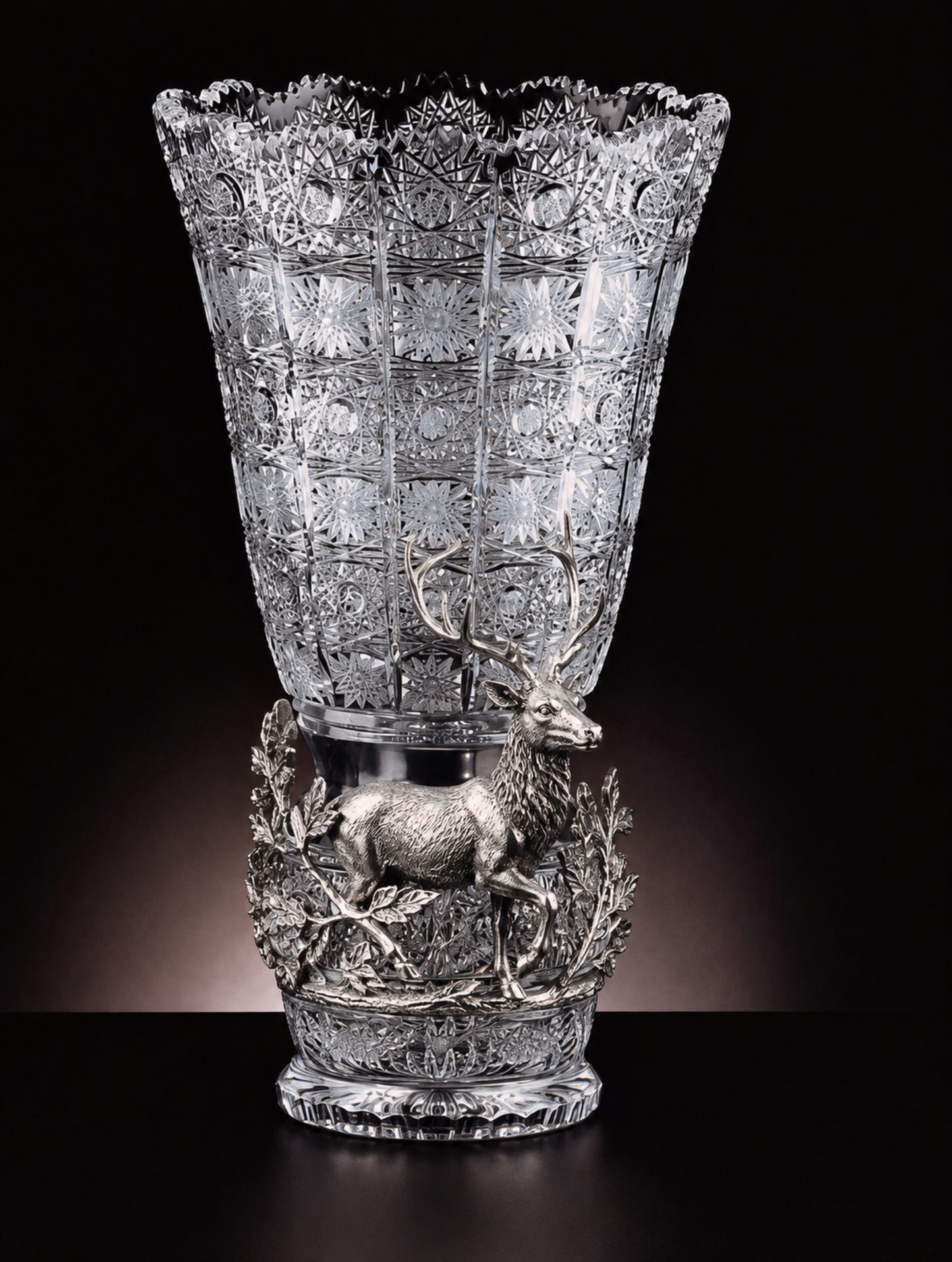 Majesty of the Forest sculptural vase in hand-cut Bohemian crystal with an elaborate sterling silver stag and woodland decoration.