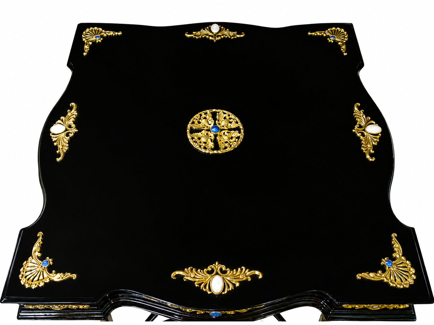 Top view of a handcrafted Napoleon Empire chess table with black lacquer surface, vermeil decorative motifs, mother of pearl inlays and central ornamental medallion.