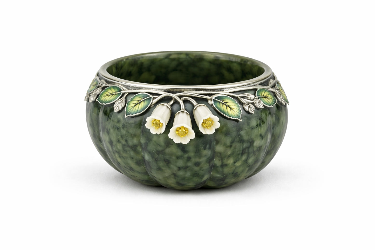 Nephrite jade tea cup with sculpted silver branches, white jade bluebell flowers, and yellow sapphire details in enamel leaf setting