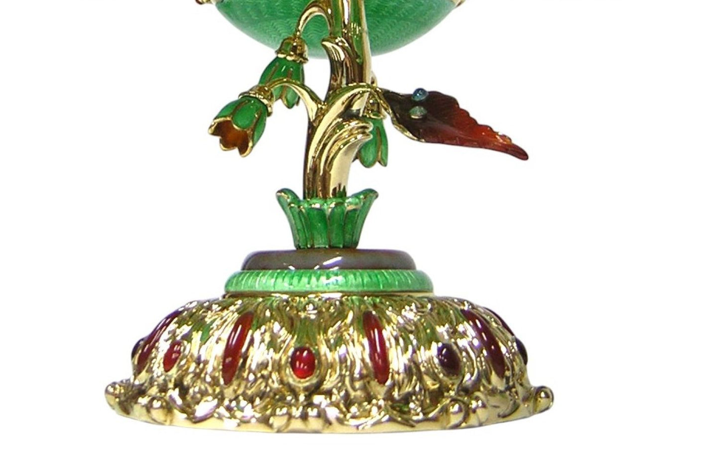 Ornate gold base with red gemstone settings and intricate detailing from Royal Bouquet monumental centerpiece