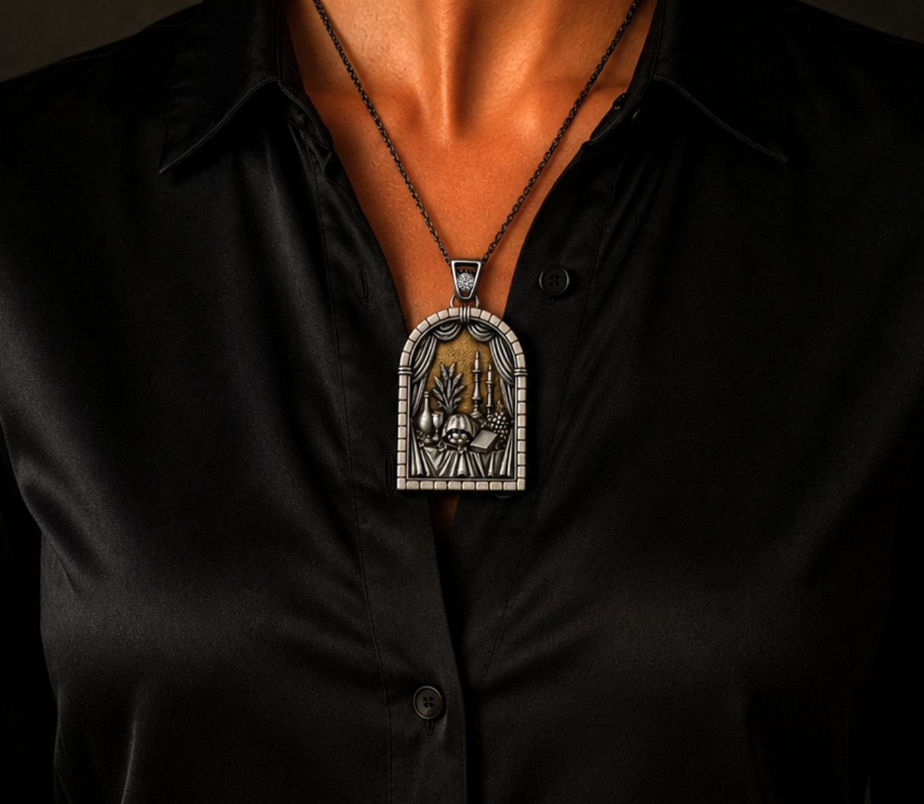 Luxury Seventh Day of Creation pendant worn as a necklace, depicting the sacred Sabbath table with challah, Kiddush cup and candles.
