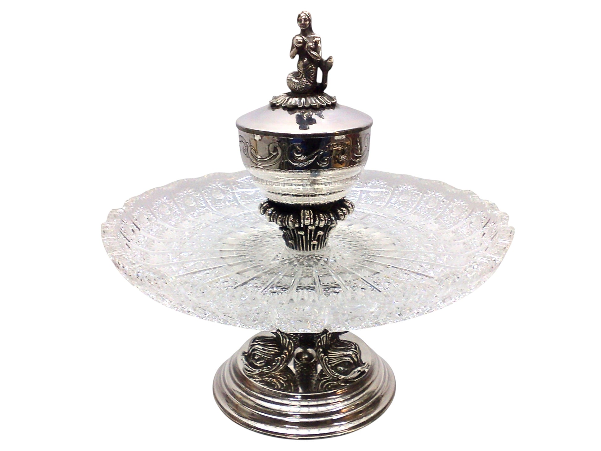 Full view of the “Enchantress of the Sea” sculptural silver caviar server featuring a mermaid handle, crystal platter, and hand-chased wave detailing, presented as a ceremonial objet d’art.