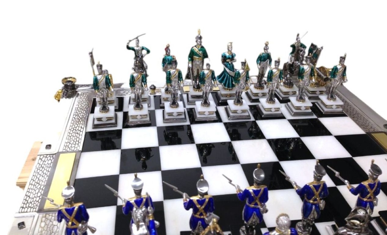 Close-up view of the fortress-style chessboard from the “Napoleon I and the Campaign of 1812 vs. Alexander I” monumental sculptural silver chess set, showing onyx playing squares, architectural detailing, and refined hot enamel accents.