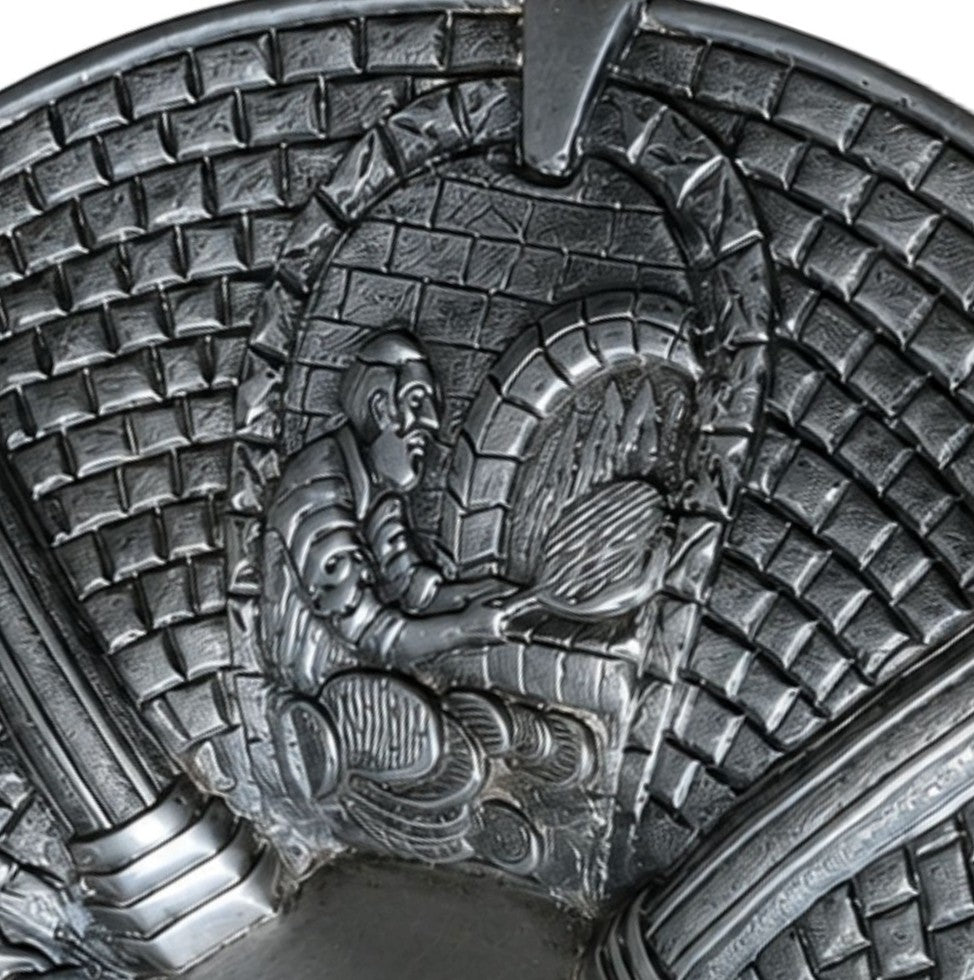 Close-up detail of the sterling silver Passover Seder plate featuring the Paschal lamb relief, symbolizing redemption, divine protection, and the Exodus from Egypt.