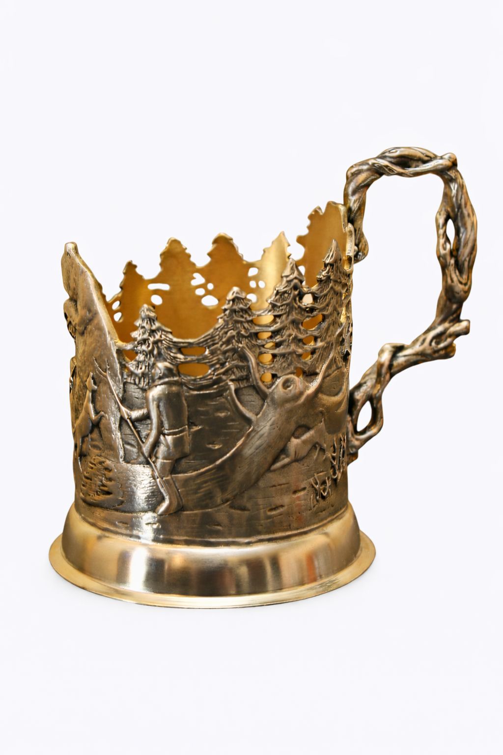 Sterling silver gilt cup holder with winter forest narrative relief depicting hunters, animals, pine trees, and traditional rural life, sculpted handle shaped as intertwined branches