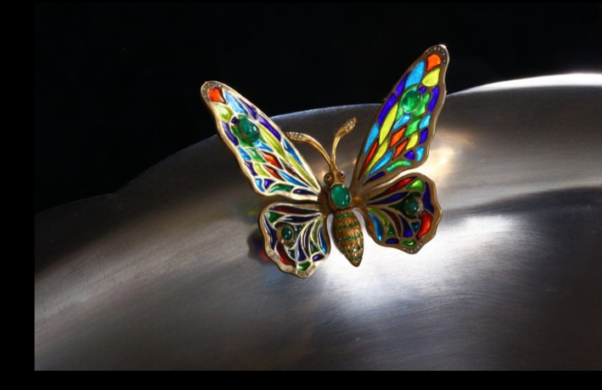 Alternate close-up of a handcrafted butterfly in the “Summer Pond” centerpiece, highlighting translucent plique-a-jour enamel, color depth, and jewelry-grade craftsmanship.