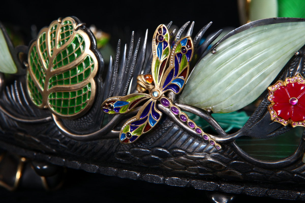 Close-up of a dragonfly rendered in hot enamel on the lower section of the vase in the “Summer Pond” centerpiece, displaying vibrant color and refined enamel technique.