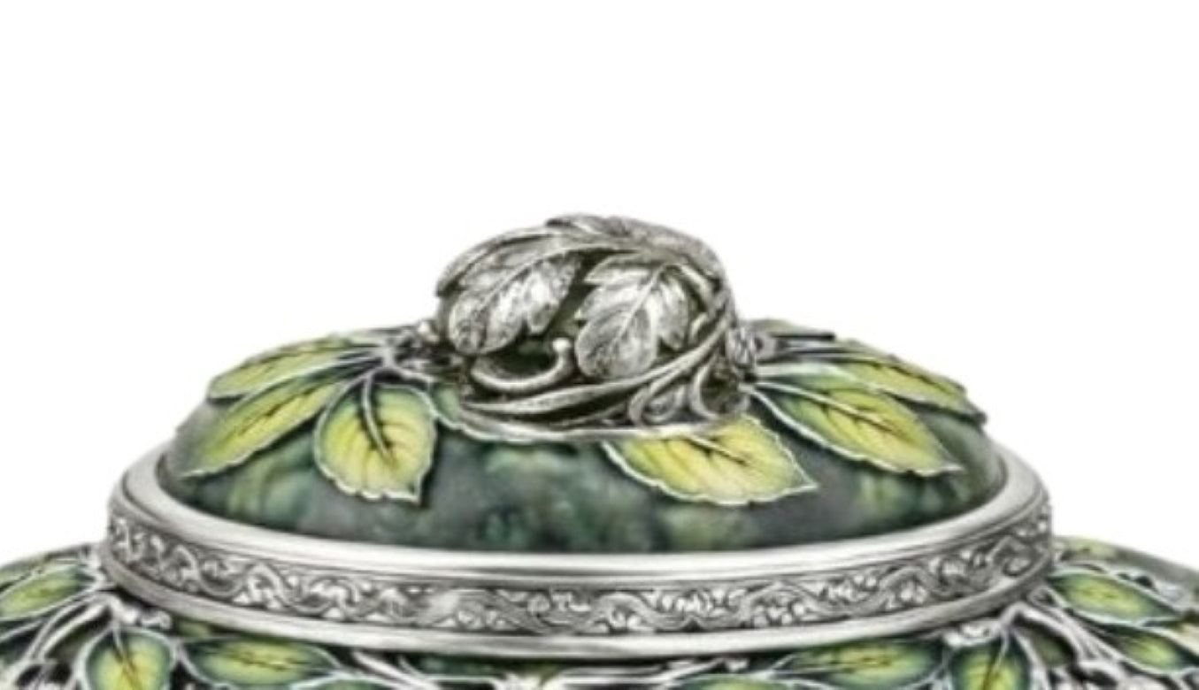 Teapot lid detail with sculpted silver leaves and green enamel over nephrite jade, showcasing handcrafted botanical ornamentation