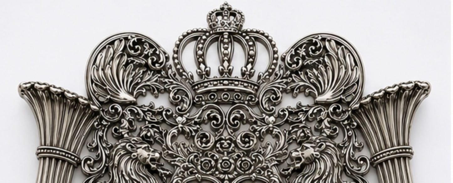 Detail of raised Hebrew Ten Commandments tablets framed by heraldic lions and elaborate sterling silver scrollwork on the Royal Guardian Lions Torah shield.