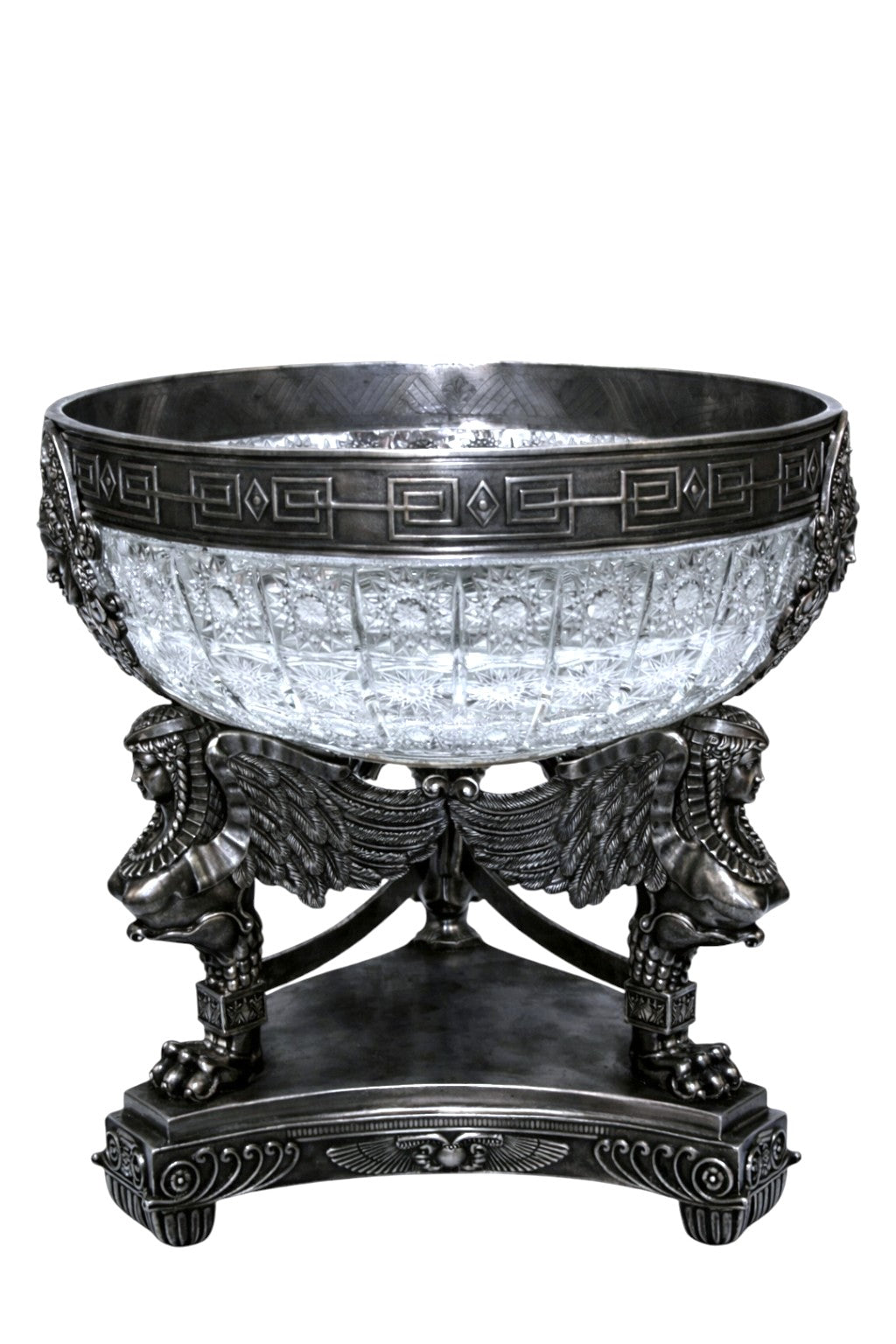 Handcrafted crystal bowl set in monumental sterling silver centerpiece with classical geometric border and sculptural detailing.