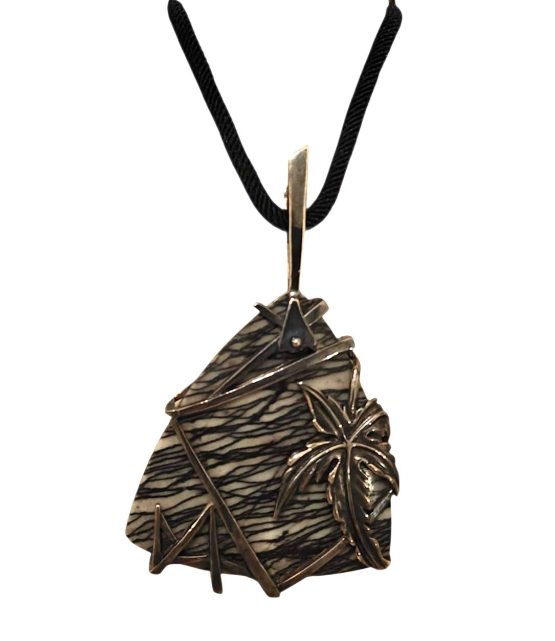 Weaver of Dreams pendant by Konforti Jewelry shown on a necklace, featuring a 51.3 ct landscape jasper set in handcrafted 925 silver with artistic tarnishing that highlights the stone’s natural patterns.